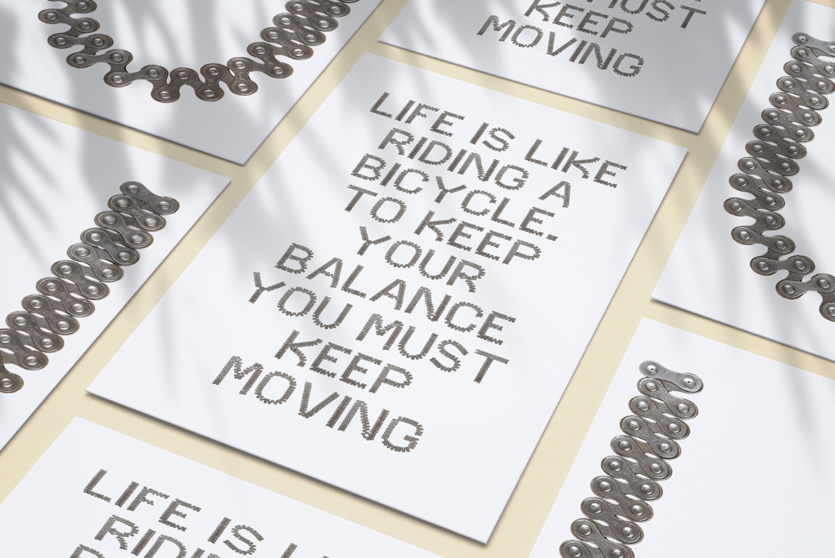 Pale posters carrying a short text set in the Chain-Zigzag Font