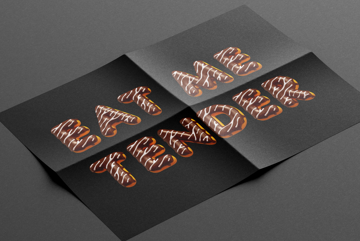 Folded black flyer with two words set in the Profiterole Font.