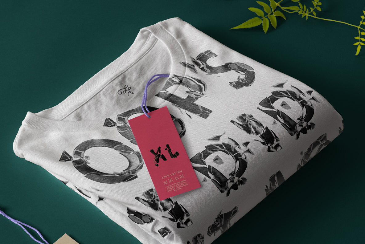 Folded sweatshirt mockup printed with shattered lettering in A Broken Life Font