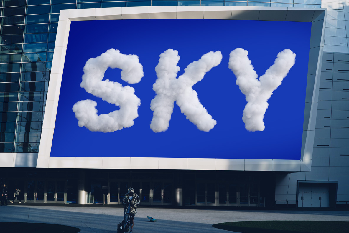 The word Sky in Cloudy Day Font on a building billboard mockup