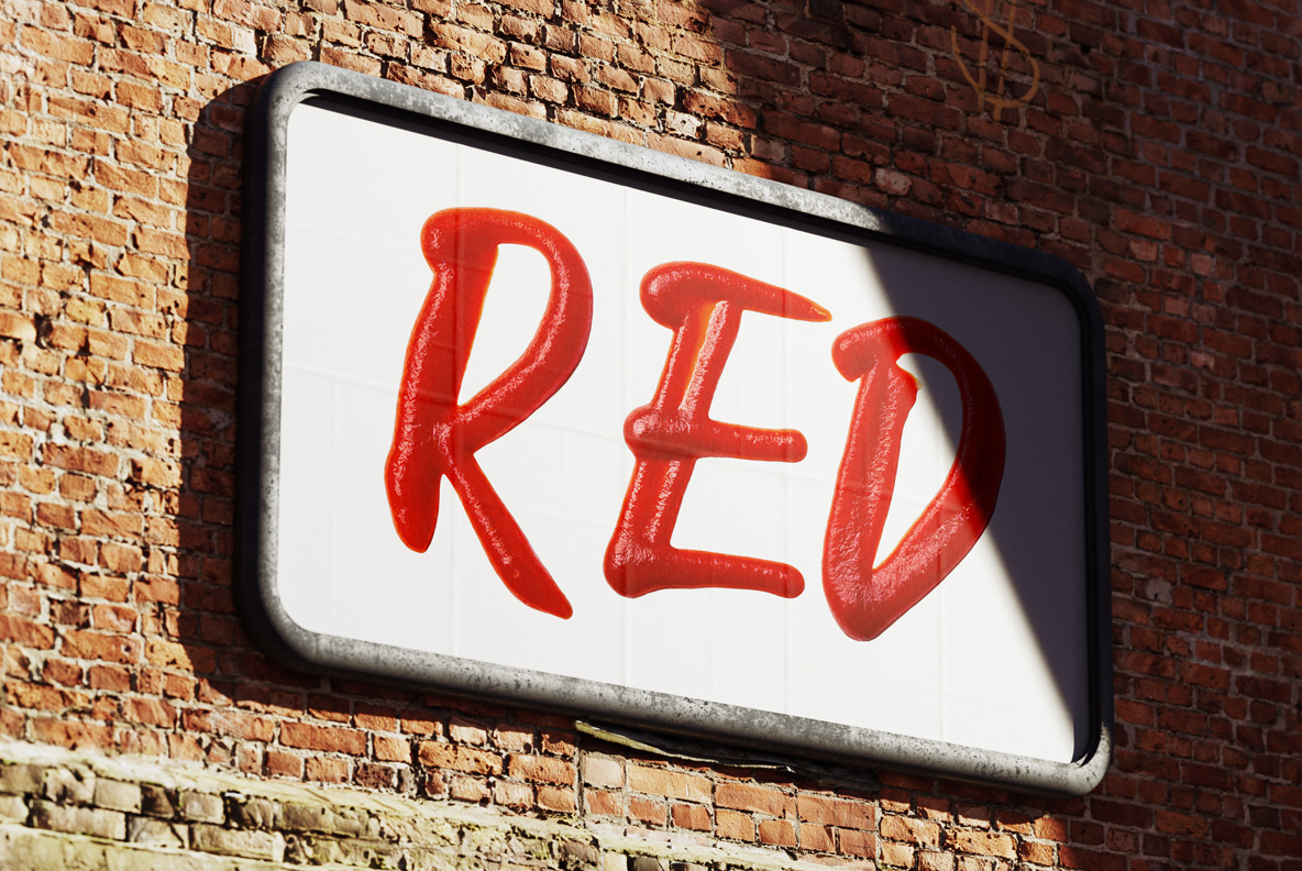 Ketchup Script Font On A Brick Wall Billboard Brick wall billboard with a single word set in the Ketchup Script Font.