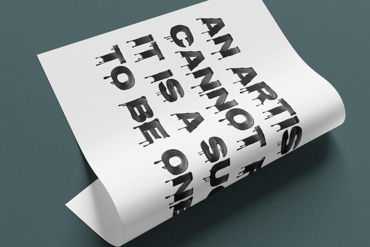 Curled white poster with four lines of text set in the Stroke Edge Font
