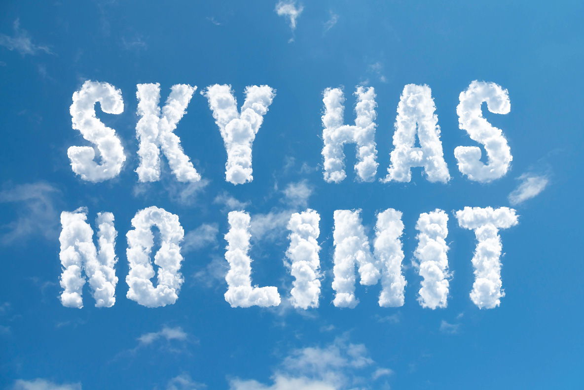 Puffy Clouds Font – Sky Has No Limit Quote Puffy Clouds Font spelling Sky Has No Limit in large white cloud letters across a bright blue sky.