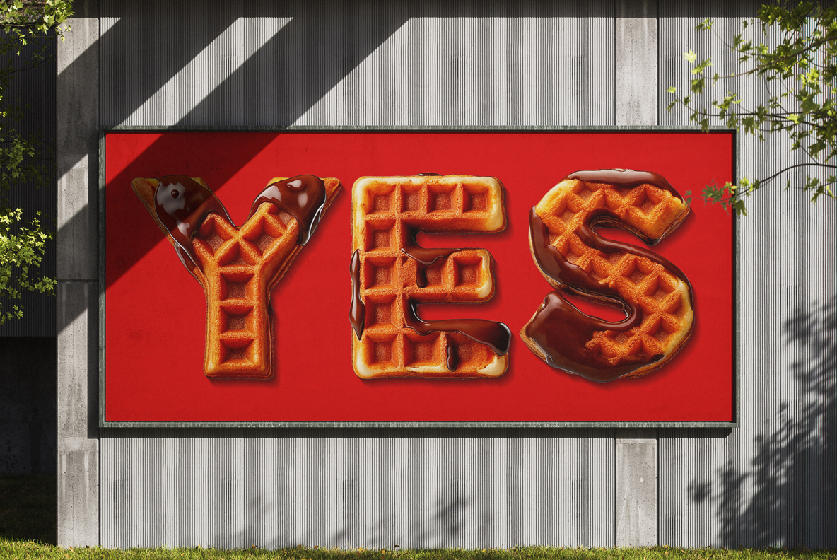 Waffle Drip Font – Red Billboard Mockup Red outdoor billboard spelling YES in Waffle Drip Font waffle letters with chocolate