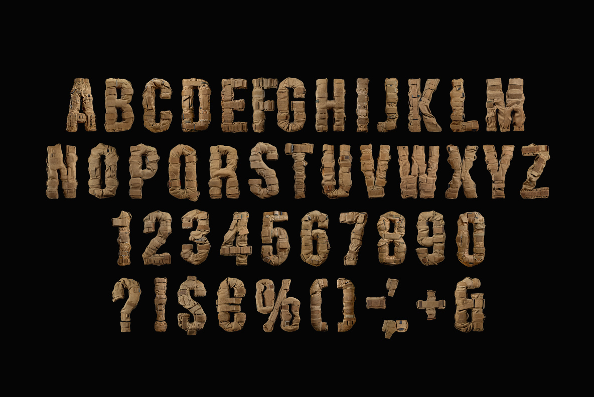 Military Font uppercase alphabet, numbers and punctuation made from tan tactical fabric on black